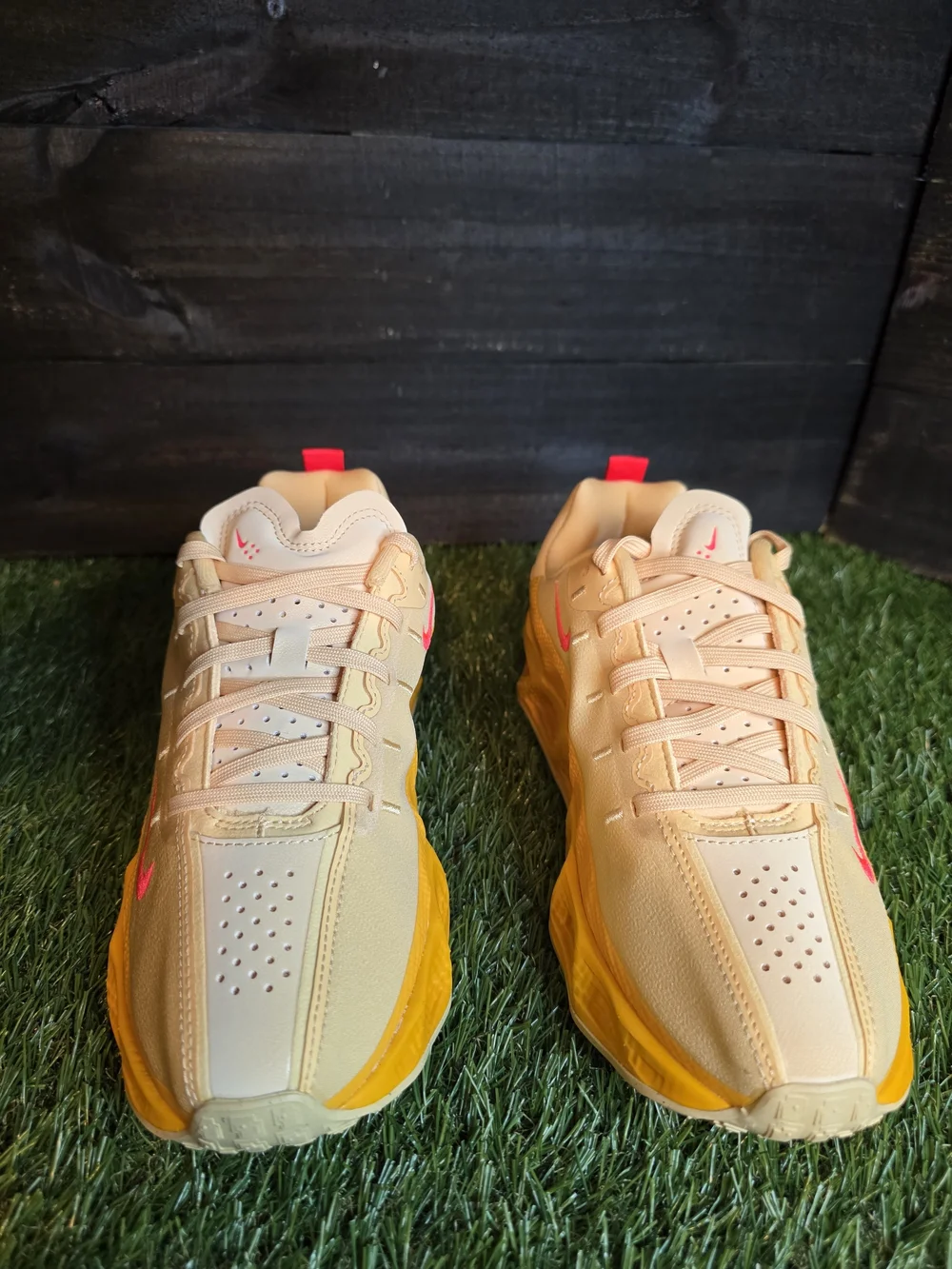 Nike Peach and Yellow Low-Top Sneakers with Pink Swoosh
